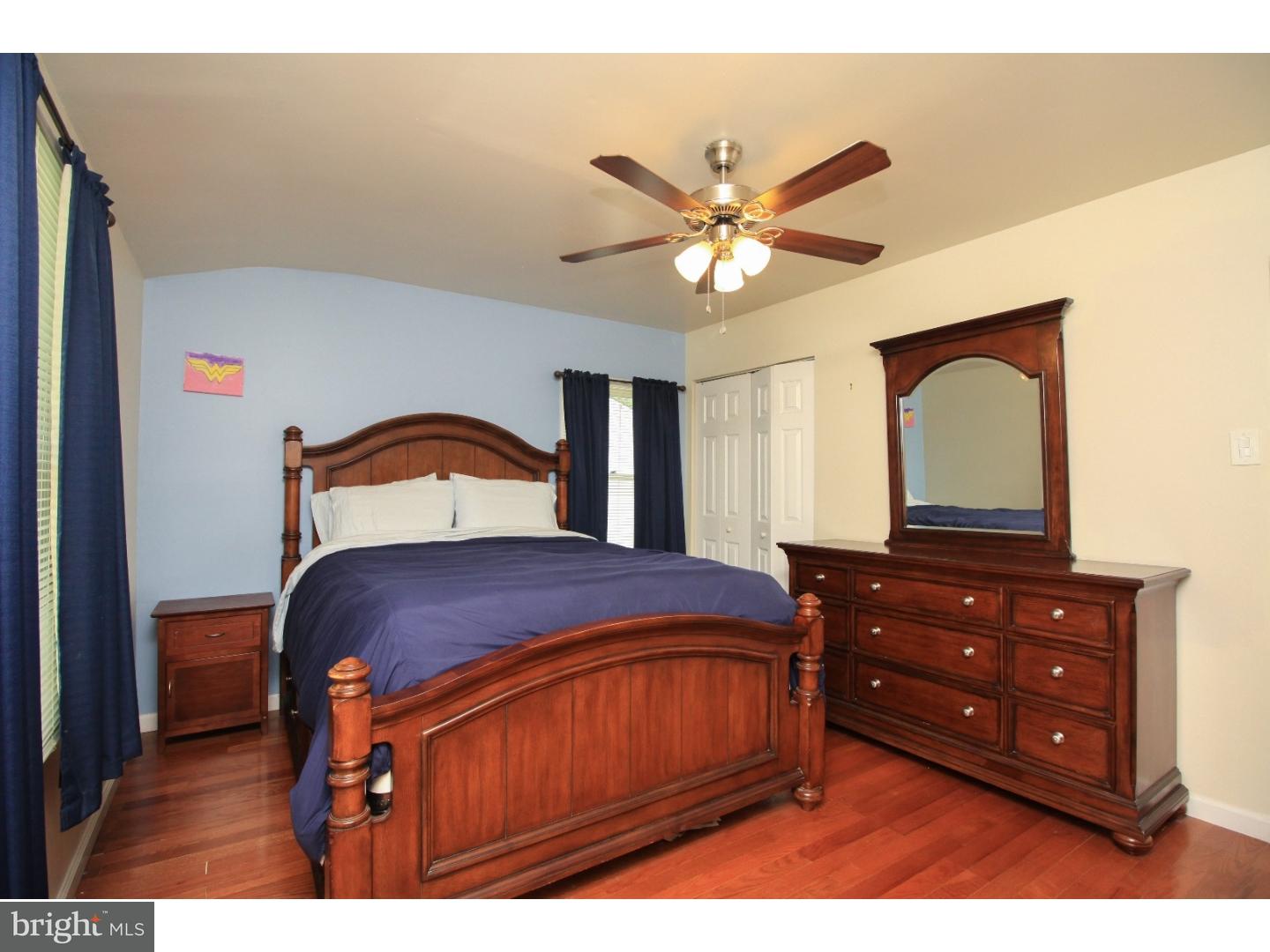 101 Round Hill Road Voorhees, NJ 08043 - Photo 11 of 25 a bedroom with a bed and a dresser