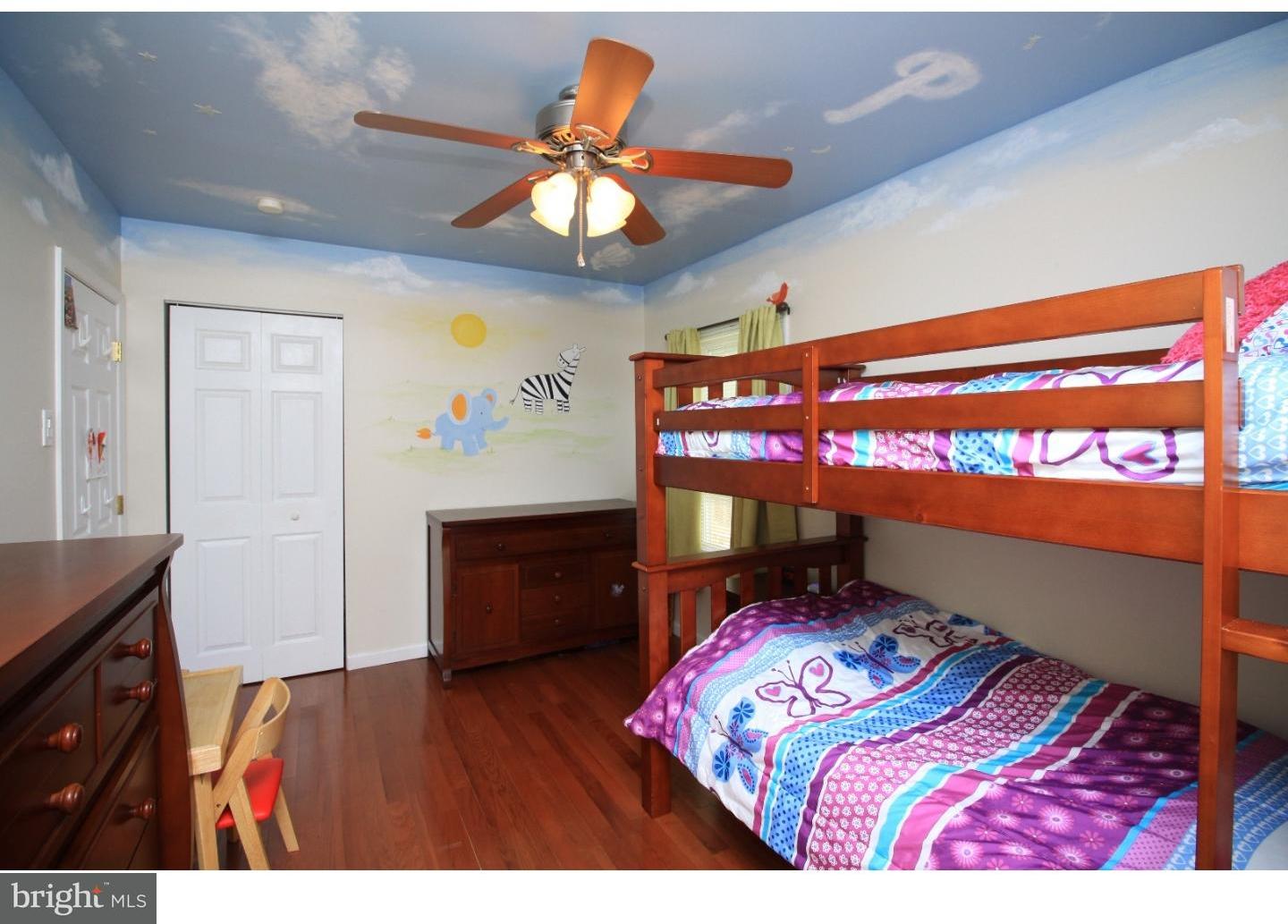 101 Round Hill Road Voorhees, NJ 08043 - Photo 16 of 25 a bedroom with a bed and a flat screen tv