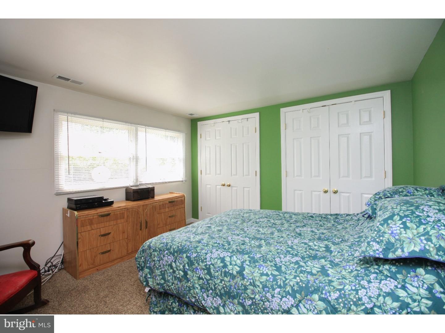 101 Round Hill Road Voorhees, NJ 08043 - Photo 20 of 25 a bedroom with a bed and a window