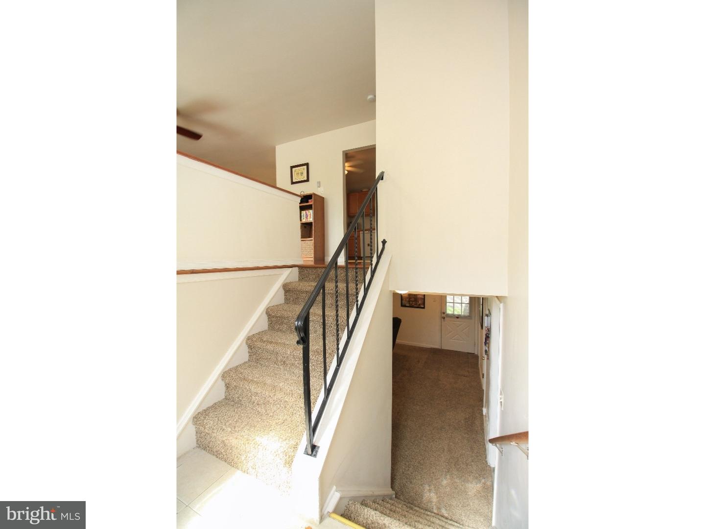 101 Round Hill Road Voorhees, NJ 08043 - Photo 3 of 25 a view of a hallway with stairs