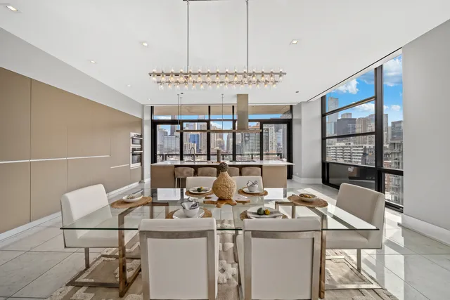 a view of a dining room with furniture window and outside view