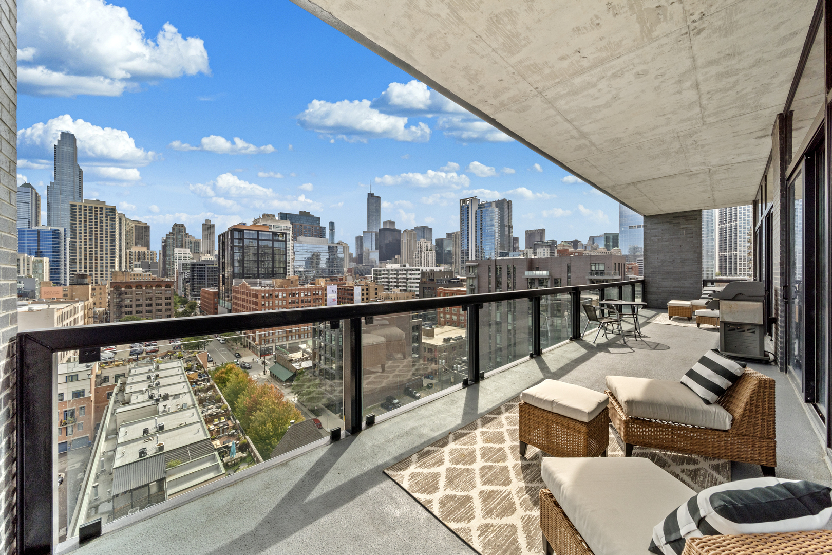 400 West Huron Street, Unit 1001 Chicago, IL 60654 - Photo 34 of 41 a view of a balcony with chairs