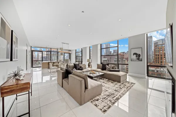 a living room with furniture and a table