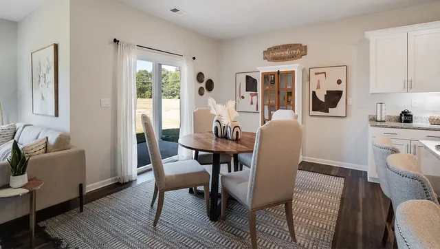 a kitchen with a sink stove and refrigerator