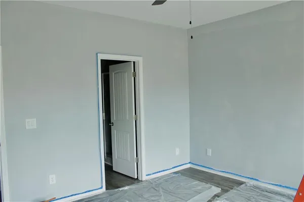 a view of a bathroom from a hallway