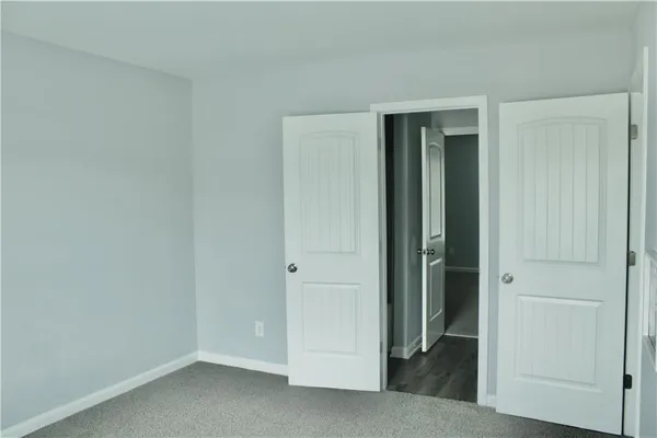 an empty room with closet