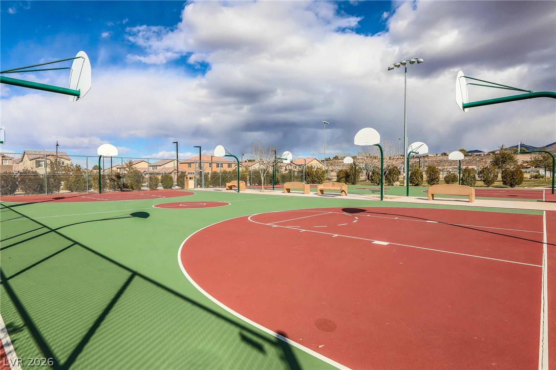 2166 Trivero Street Henderson, NV 89044 - Photo 60 of 61 A vibrant basketball court offers recreational space with a scenic backdrop.