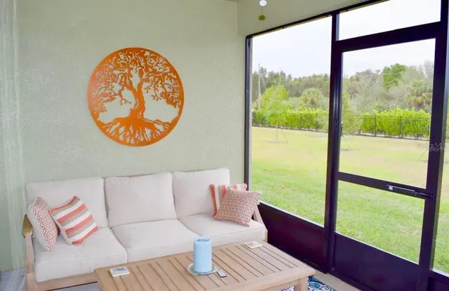 a living room with large window