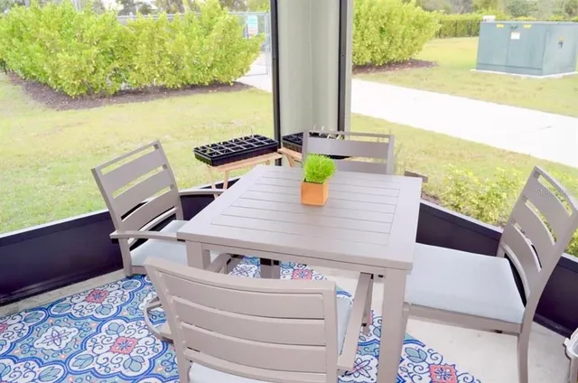 a workspace with furniture and window