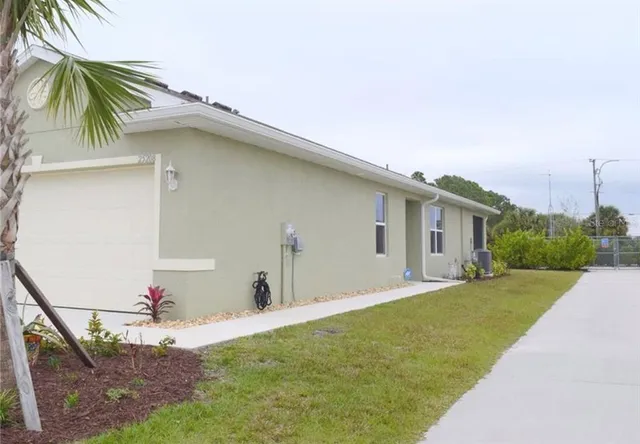 a view of a swimming pool and an outdoor space