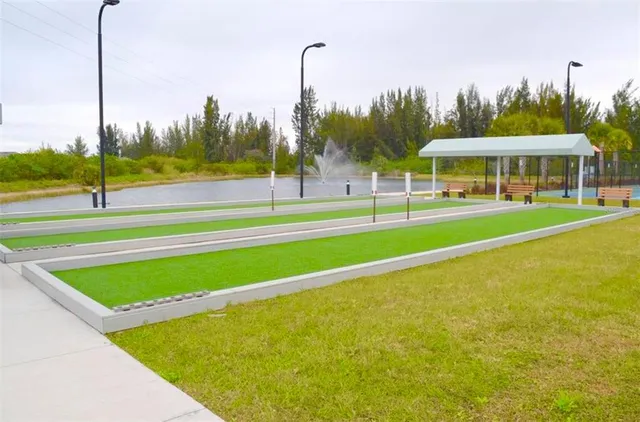 swimming pool view with a outdoor seating