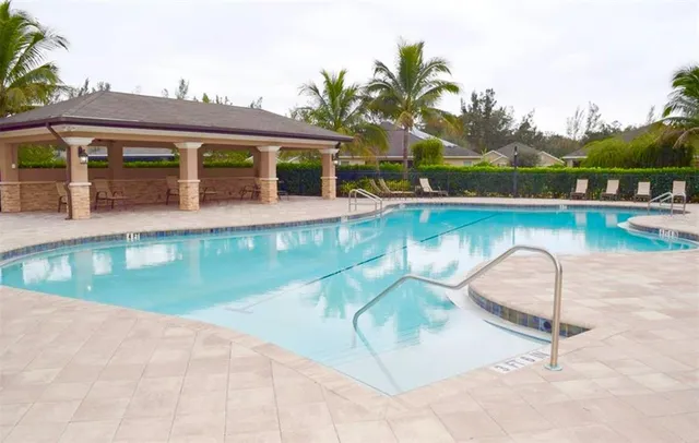 a view of a patio with a backyard