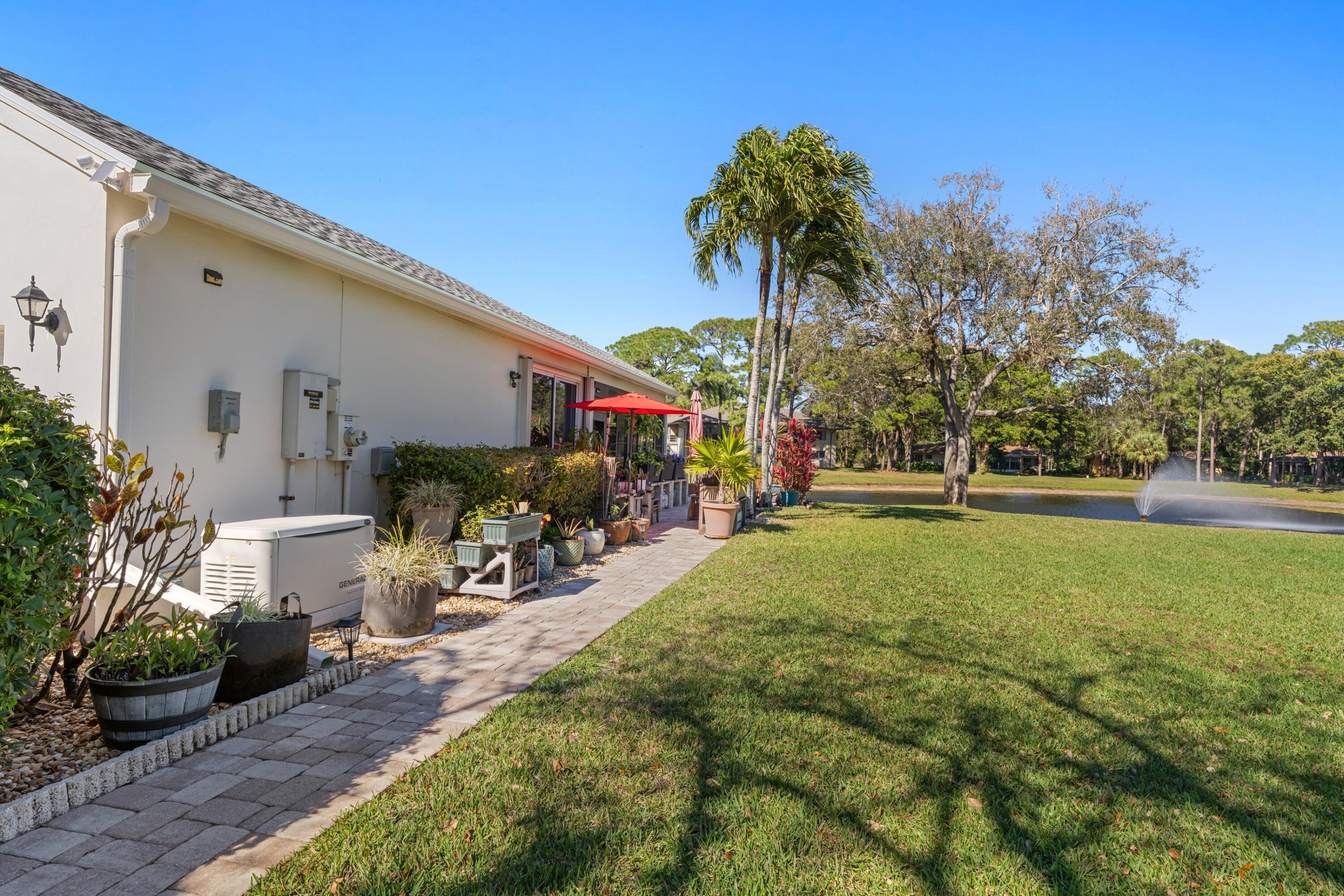 7676 Kings Ride Boynton Beach, FL 33436 - Photo 23 of 41 a view of backyard of the house