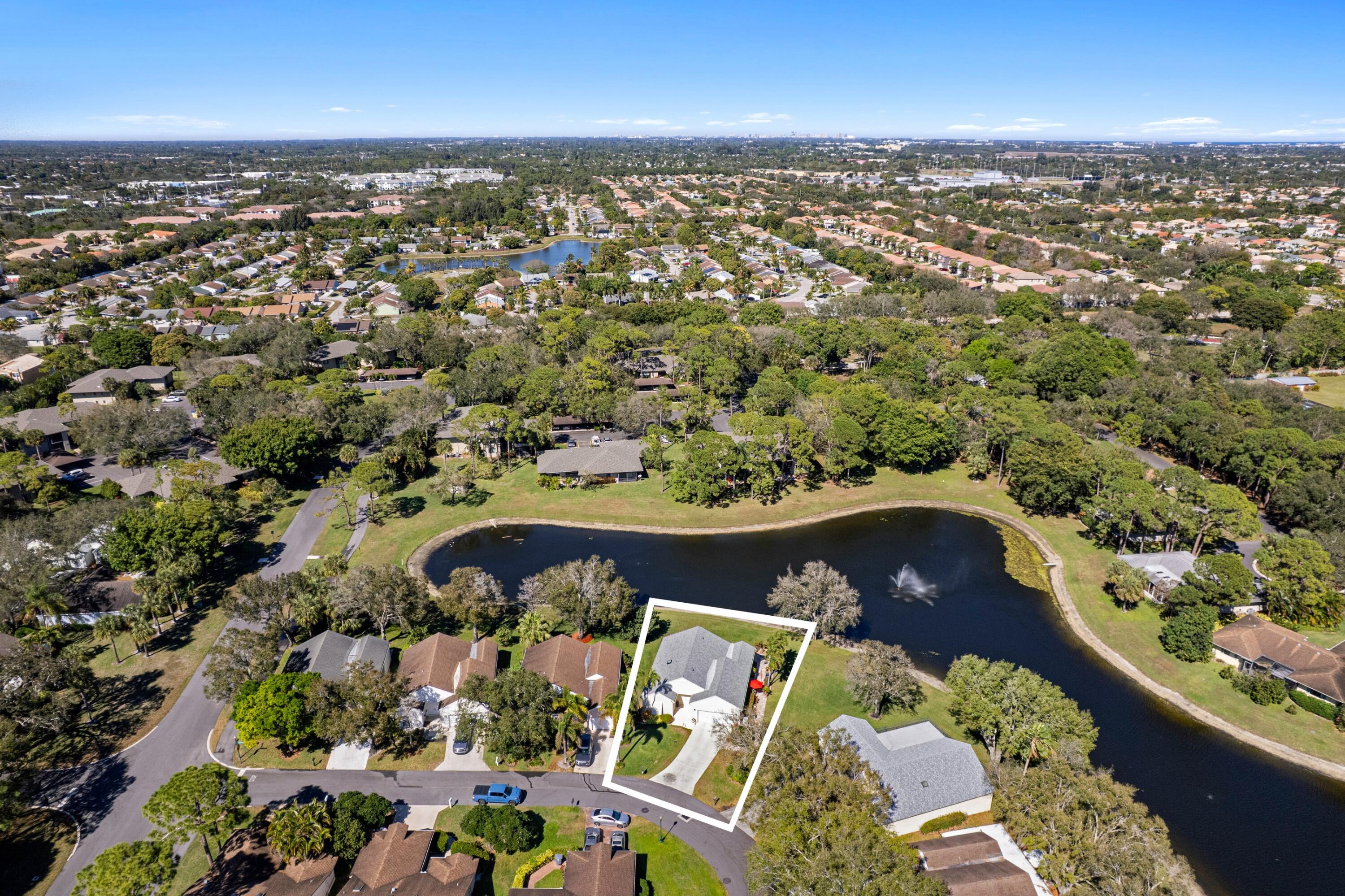 7676 Kings Ride Boynton Beach, FL 33436 - Photo 28 of 41 an aerial view of a city with lots of residential buildings