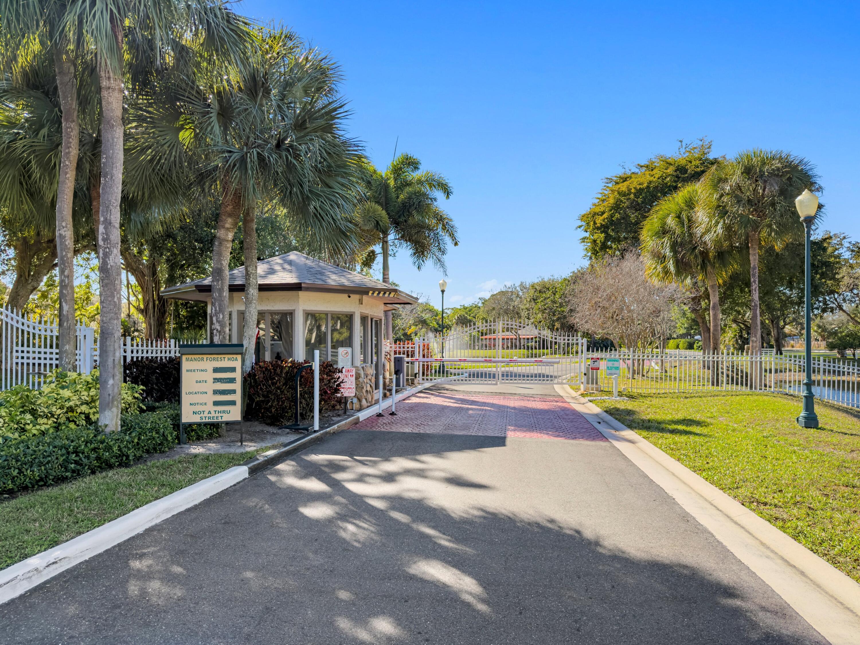 7676 Kings Ride Boynton Beach, FL 33436 - Photo 33 of 41 a view of a swimming pool with a patio and a yard