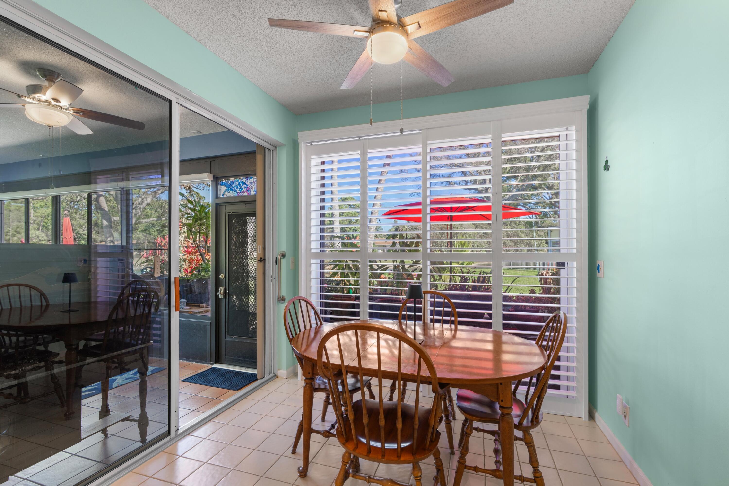 7676 Kings Ride Boynton Beach, FL 33436 - Photo 9 of 41 a table and chairs in a room
