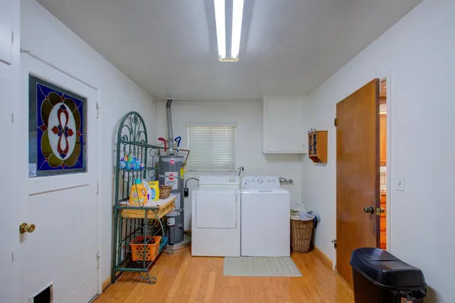 a view of a livingroom and a bathroom
