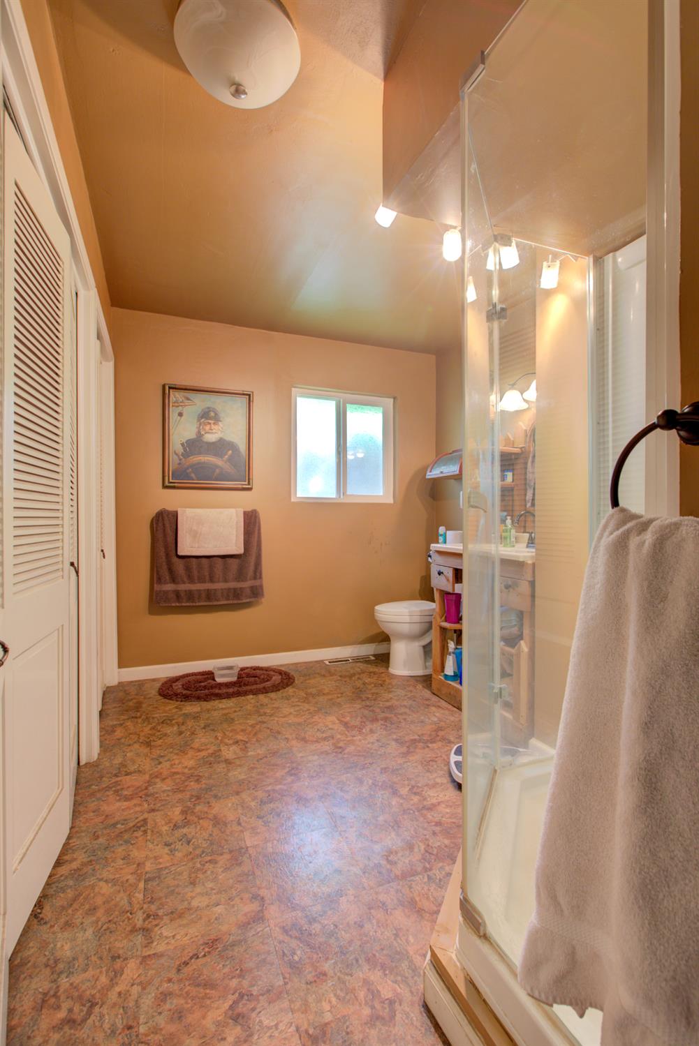 5900 Washington Road Turlock, CA 95382 - Photo 47 of 56 a view of a livingroom with kitchen and a window