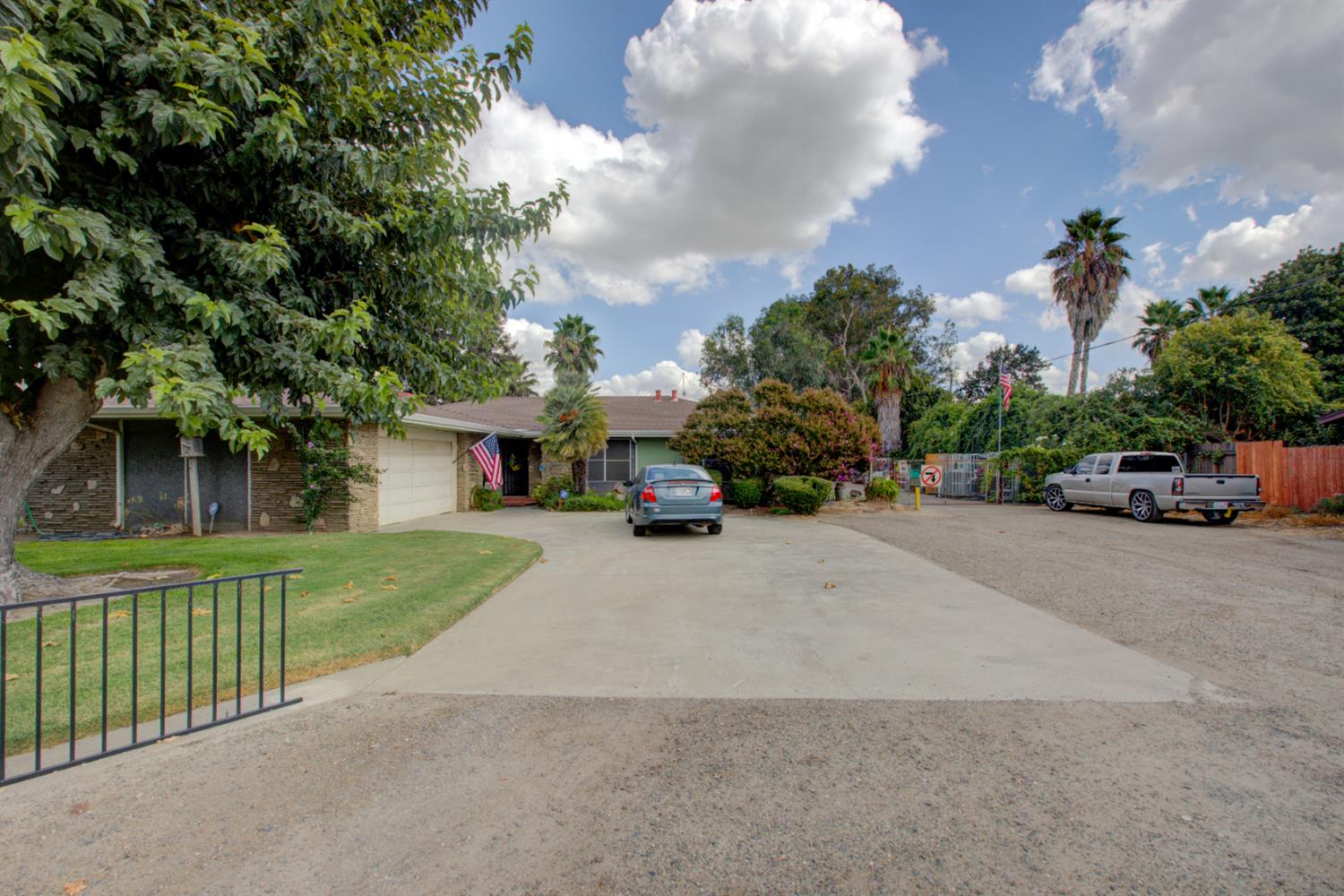 5900 Washington Road Turlock, CA 95382 - Photo 6 of 56 a car parked on the side of the road