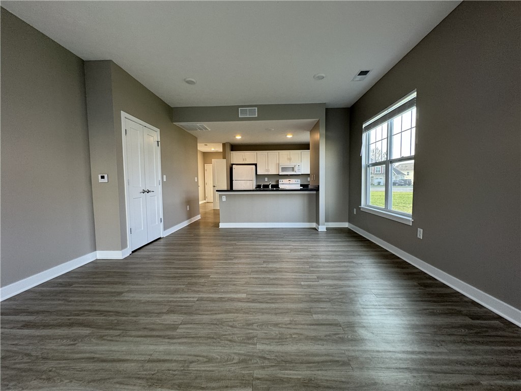 29 Grn Spg Lane Ogden, NY 14624 - Photo 8 of 22 View from far end of the great room towards kitche
