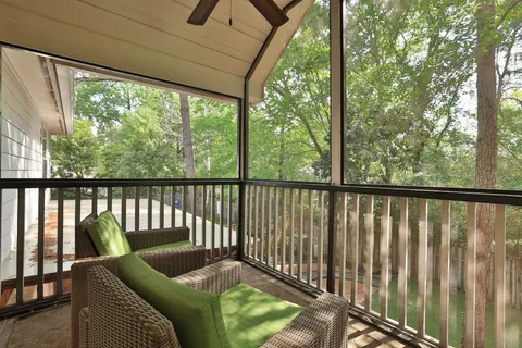 a balcony with wooden floor in outdoor space