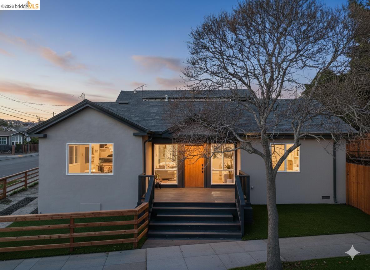 Edited photo-View of front of house with stucco siding, a shingled roof, and a deck