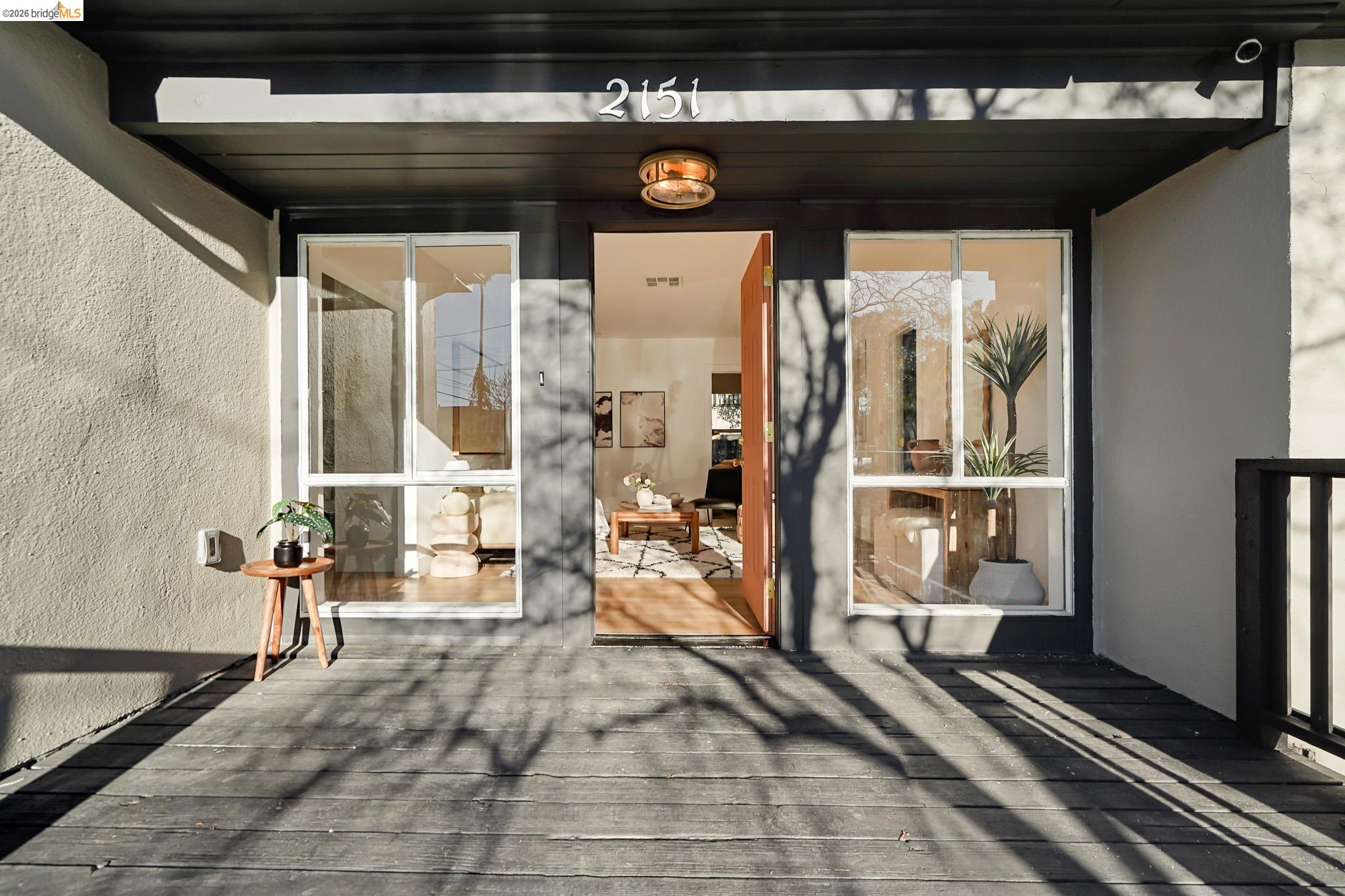 2151 Santa Rita Street Oakland, CA 94601 - Photo 35 of 46 Property entrance with stucco siding