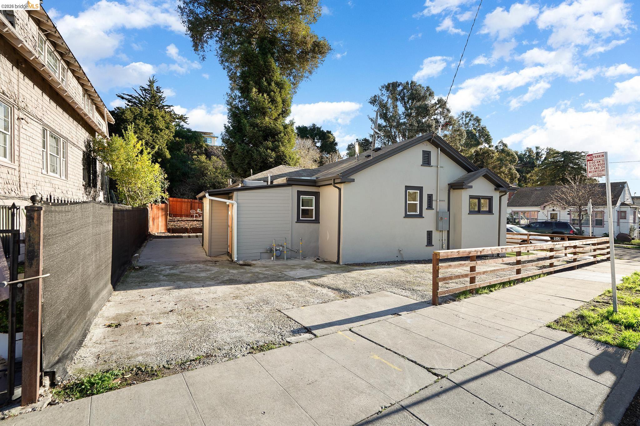 2151 Santa Rita Street Oakland, CA 94601 - Photo 40 of 46 Rear view of house with stucco siding