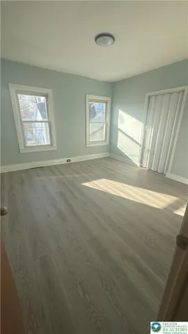 a view of an empty room and window