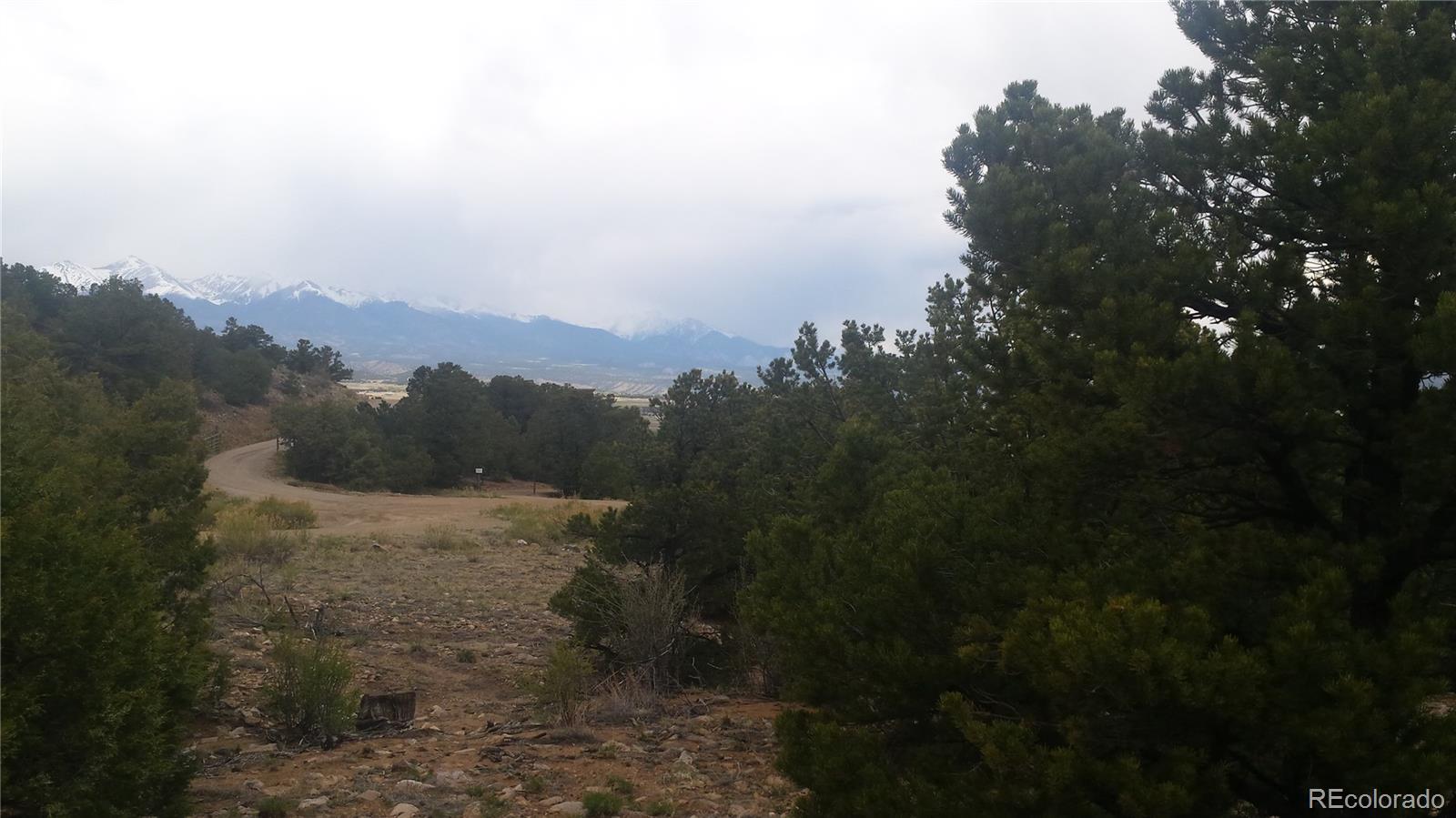 5635 Pinon Rdg Trail Salida, CO 81201 - Photo 5 of 17 a view of a yard with a mountain