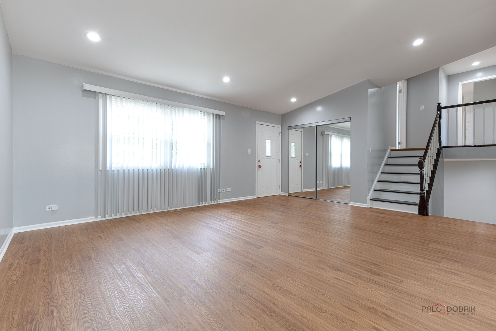 1680 Bicek Drive Hoffman Estates, IL 60192 - Photo 11 of 33 an empty room with wooden floor and windows