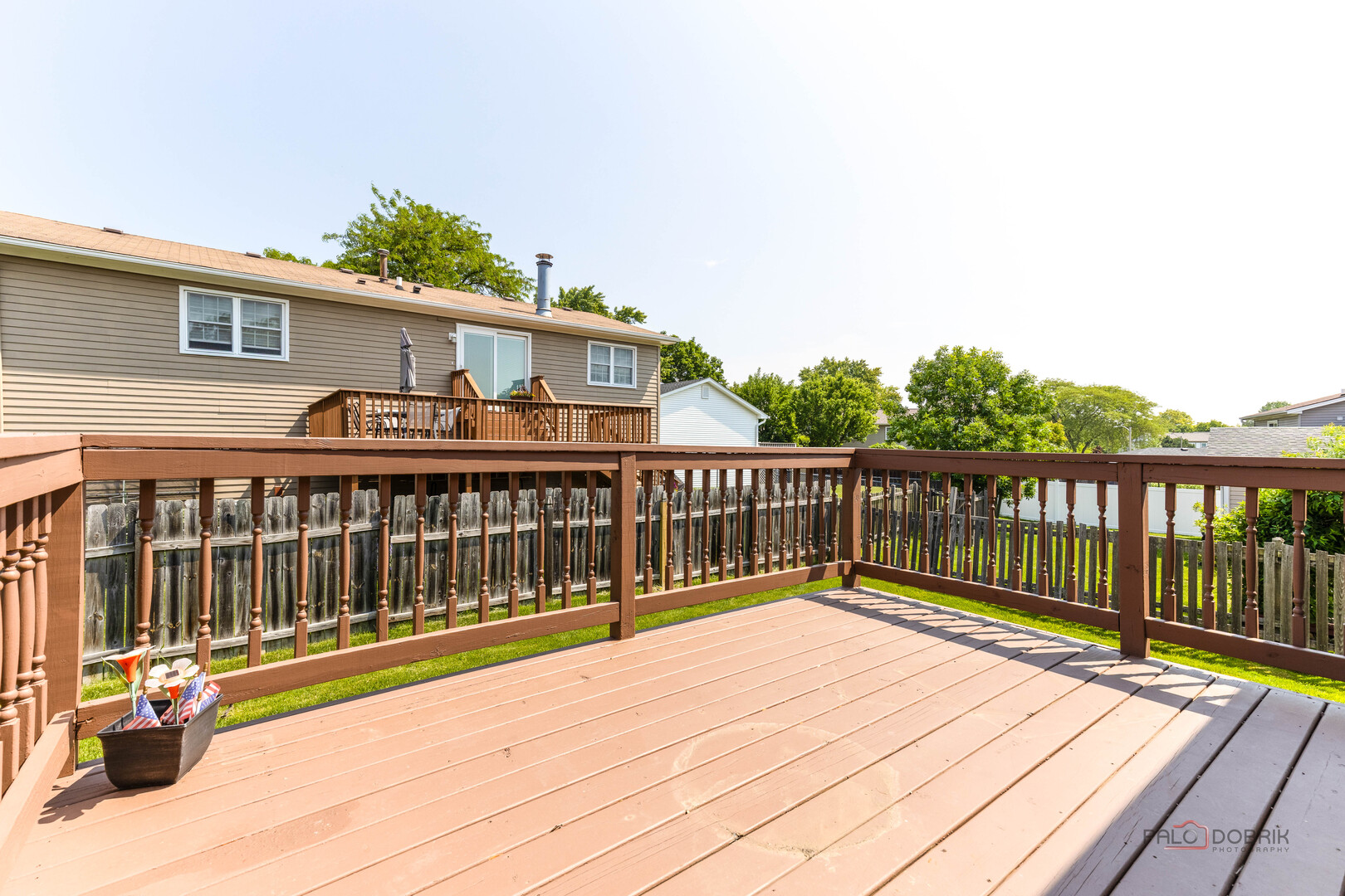 1680 Bicek Drive Hoffman Estates, IL 60192 - Photo 18 of 33 a view of a house with wooden deck