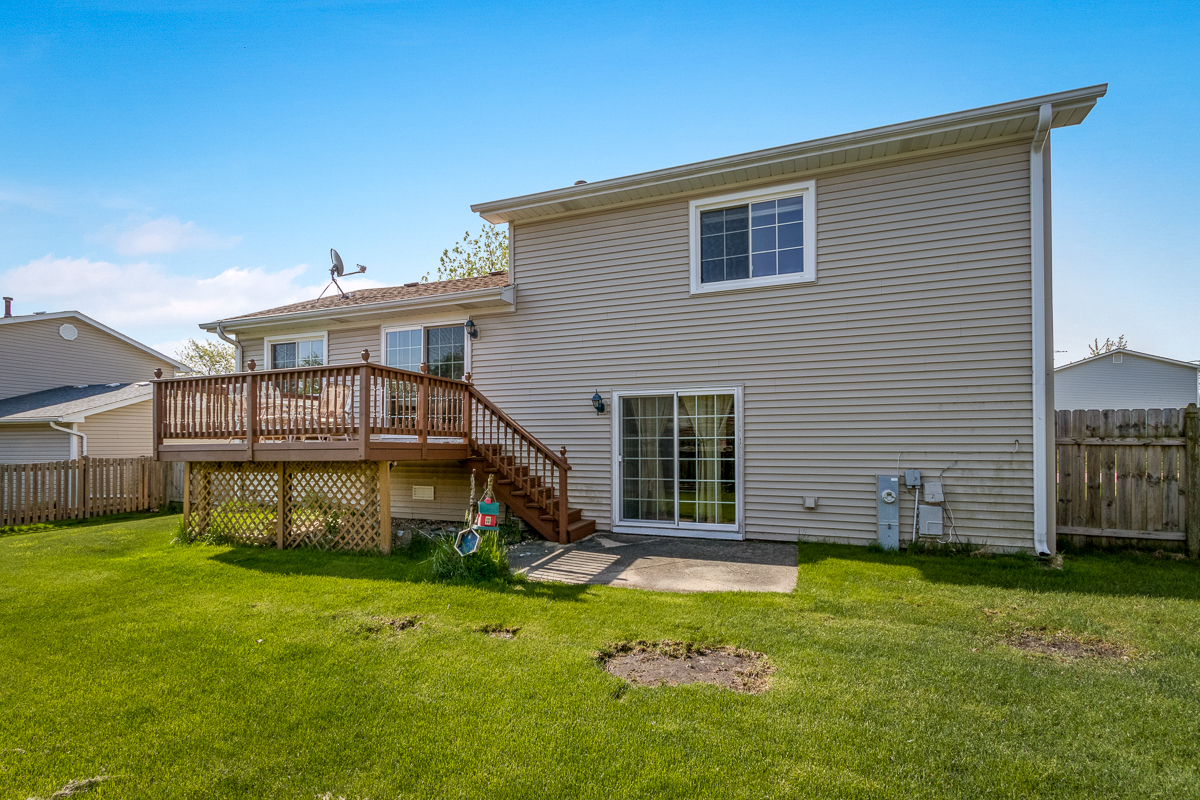 1680 Bicek Drive Hoffman Estates, IL 60192 - Photo 32 of 33 a view of a house with a yard