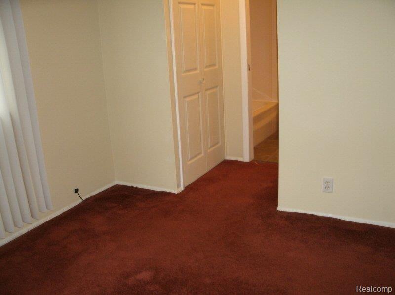 450 N Ridge South Lyon, MI 48178 - Photo 15 of 17 Master bedroom.jpg
