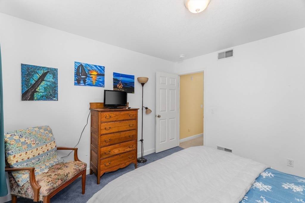 113 Greenwich Plains Road Ware, MA 01082 - Photo 28 of 42 a bedroom with a bed and furniture