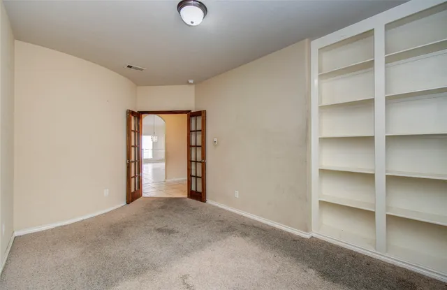 a view of a swimming pool with an outdoor space and seating area