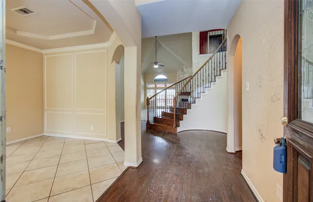 a view of entryway with wooden floor