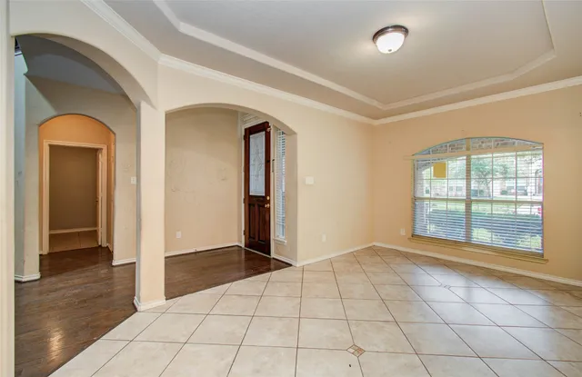 a view of an empty room and window