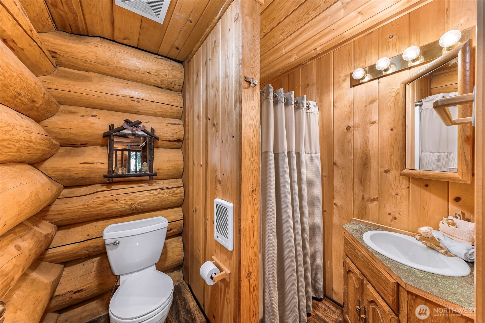 7010 Rainier Way Deming, WA 98244 - Photo 18 of 35 a bathroom with a toilet sink and shower