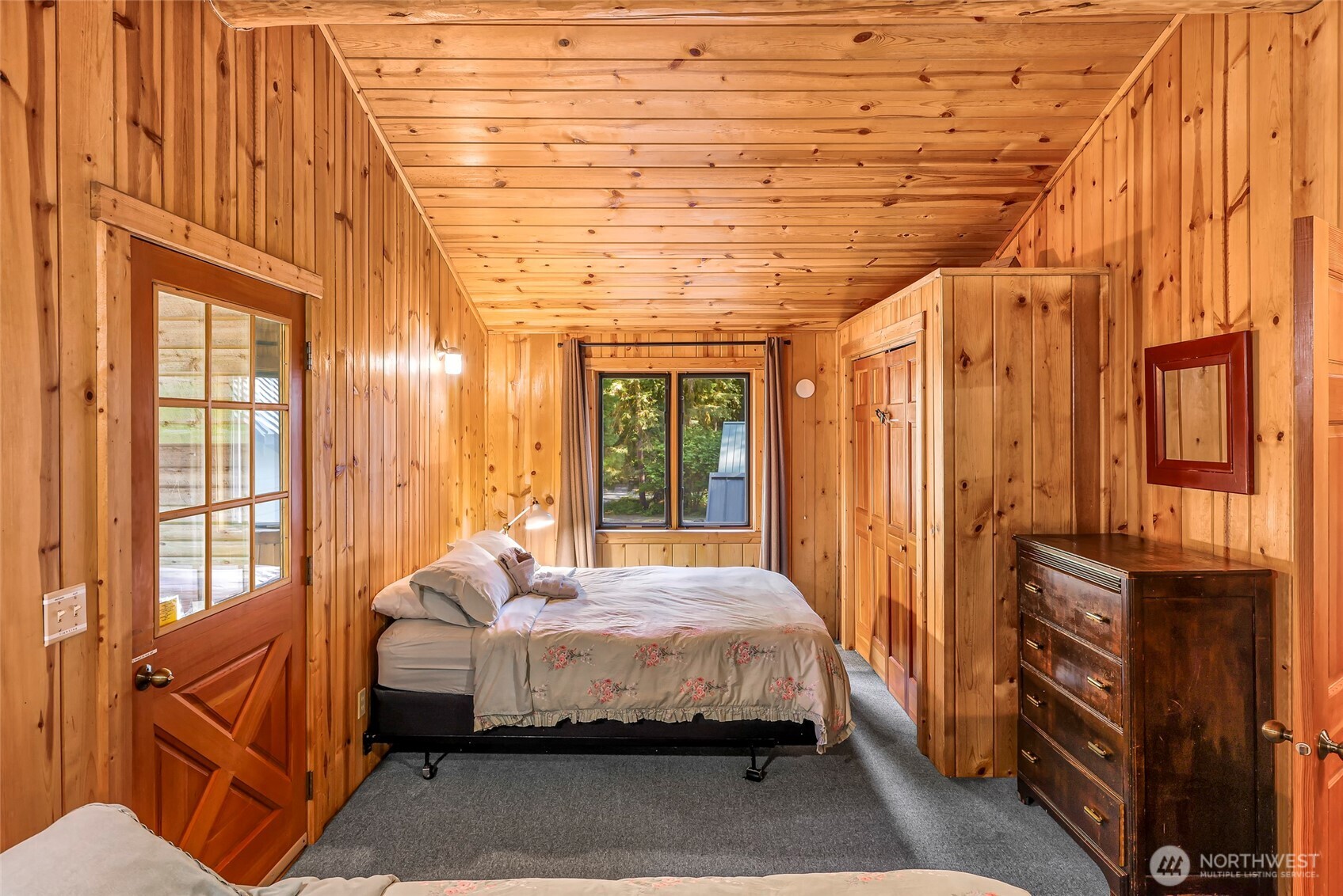 7010 Rainier Way Deming, WA 98244 - Photo 25 of 35 a bedroom with a bed next to a window
