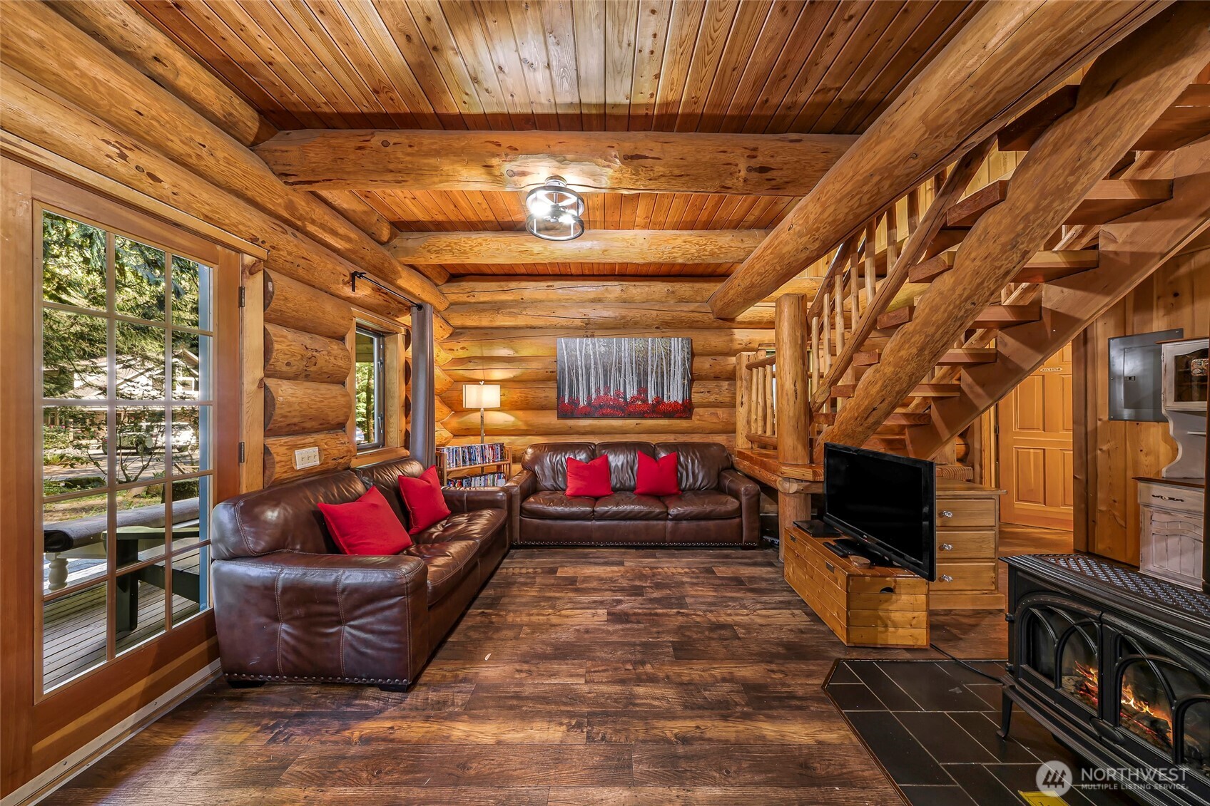 7010 Rainier Way Deming, WA 98244 - Photo 6 of 35 a living room with furniture windows and a flat screen tv