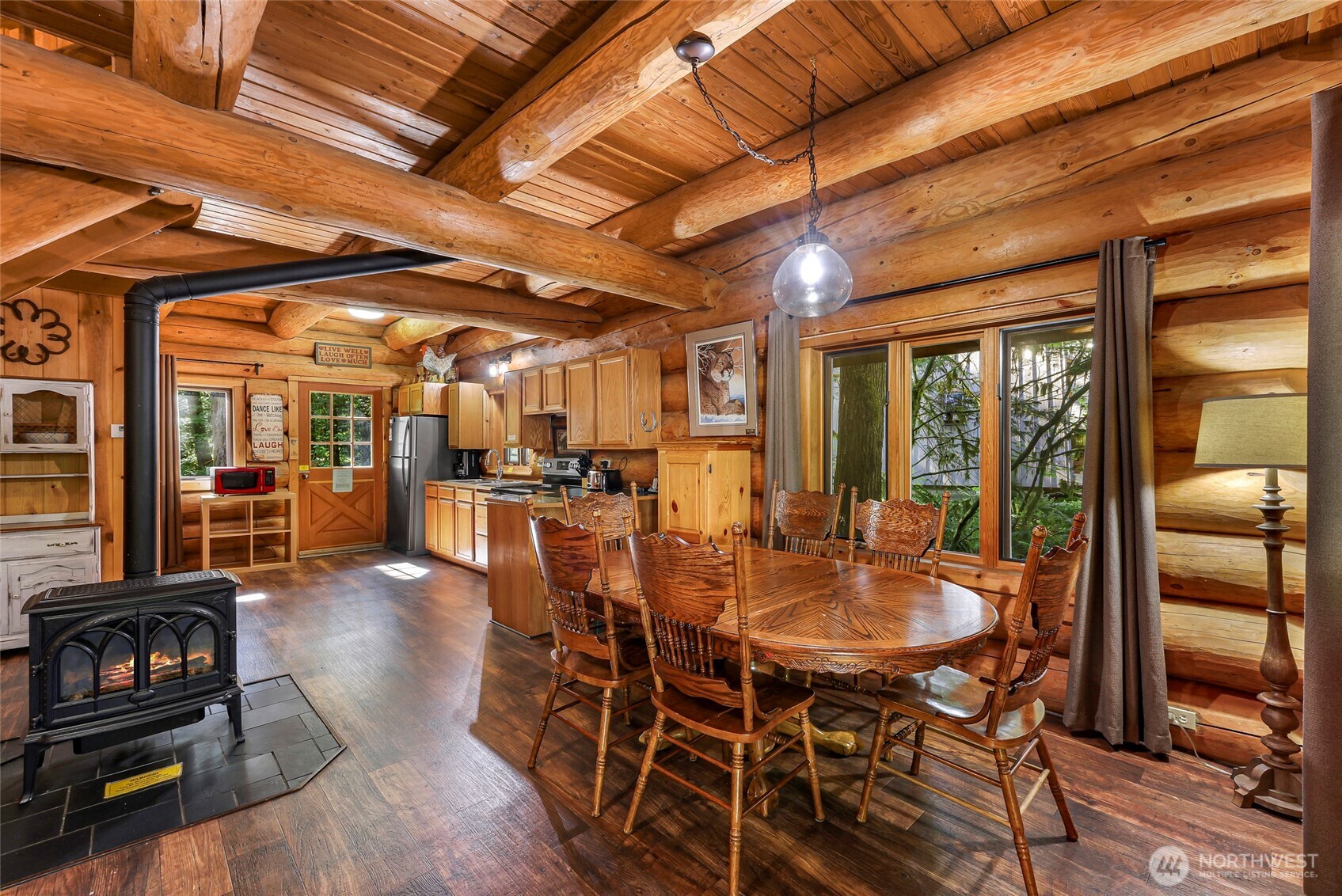 7010 Rainier Way Deming, WA 98244 - Photo 8 of 35 a view of a dining room with furniture window and outside view
