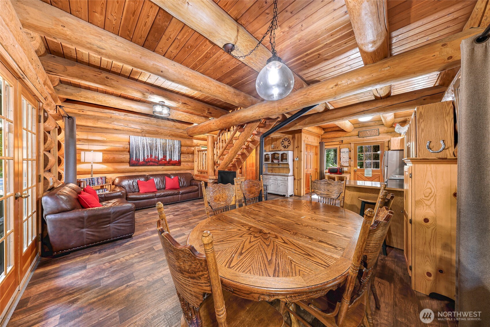 7010 Rainier Way Deming, WA 98244 - Photo 10 of 35 a outdoor dining space with furniture and a potted plant