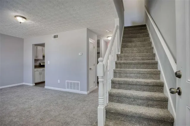 a view of a hallway with entryway