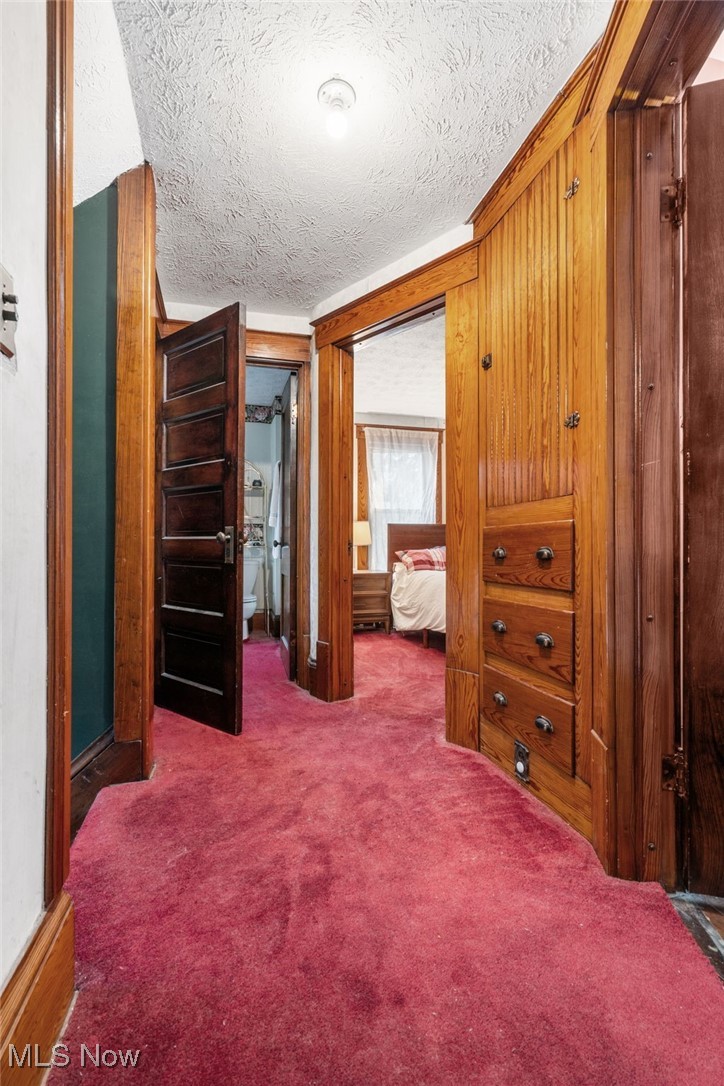 3006 Pontius Road Uniontown, OH 44685 - Photo 16 of 29 Carpeted bedroom featuring a textured ceiling
