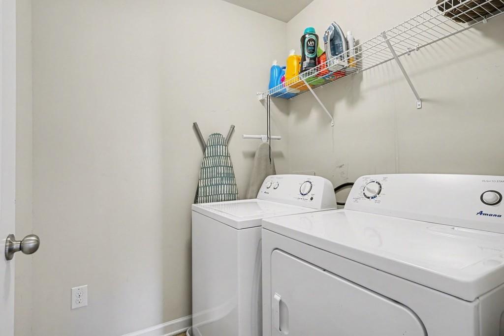 345 Arthurs Lane Covington, GA 30016 - Photo 24 of 33 a utility room with dryer and washer
