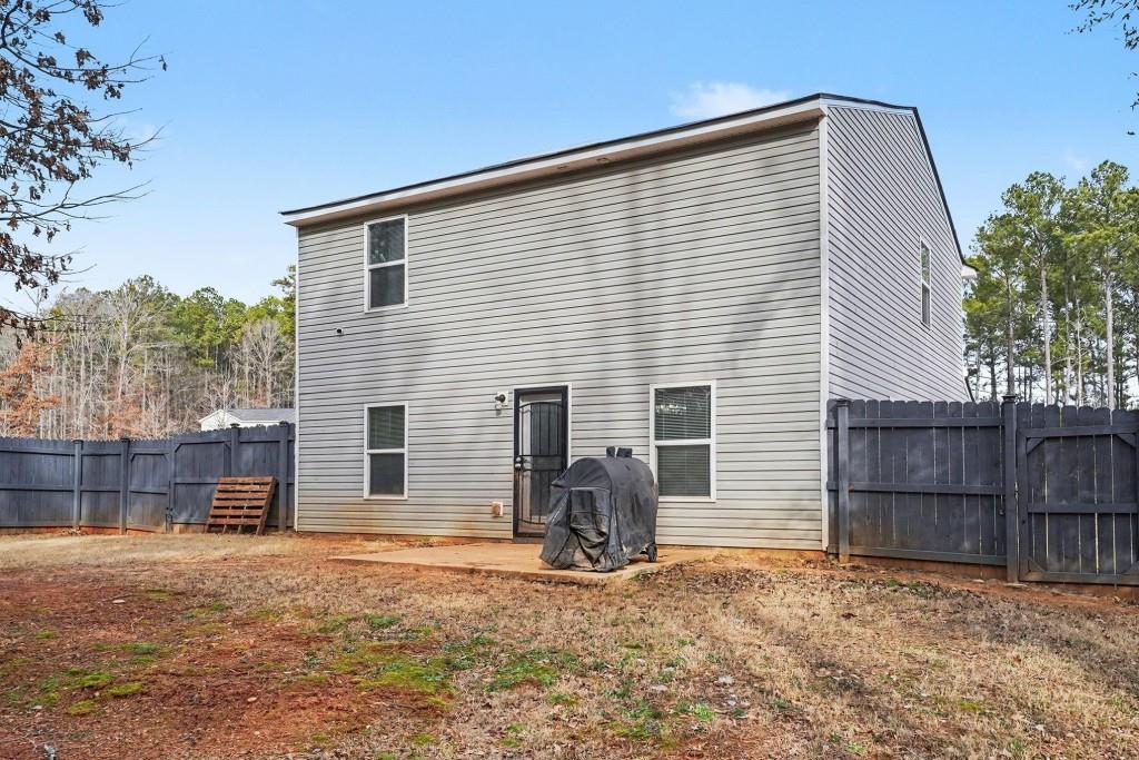 345 Arthurs Lane Covington, GA 30016 - Photo 25 of 33 a backyard of a house