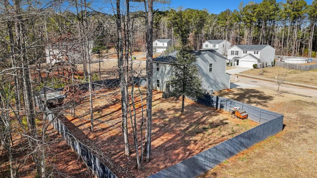 345 Arthurs Lane Covington, GA 30016 - Photo 26 of 33 a view of a backyard with sitting area