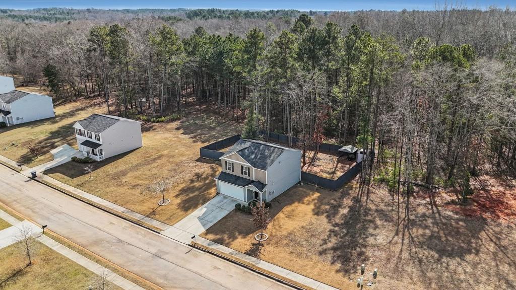345 Arthurs Lane Covington, GA 30016 - Photo 27 of 33 a view of a backyard with sitting area