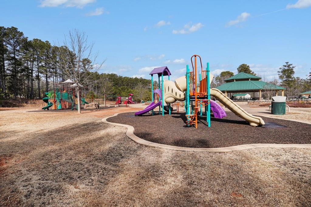 345 Arthurs Lane Covington, GA 30016 - Photo 30 of 33 a view of a park with swings